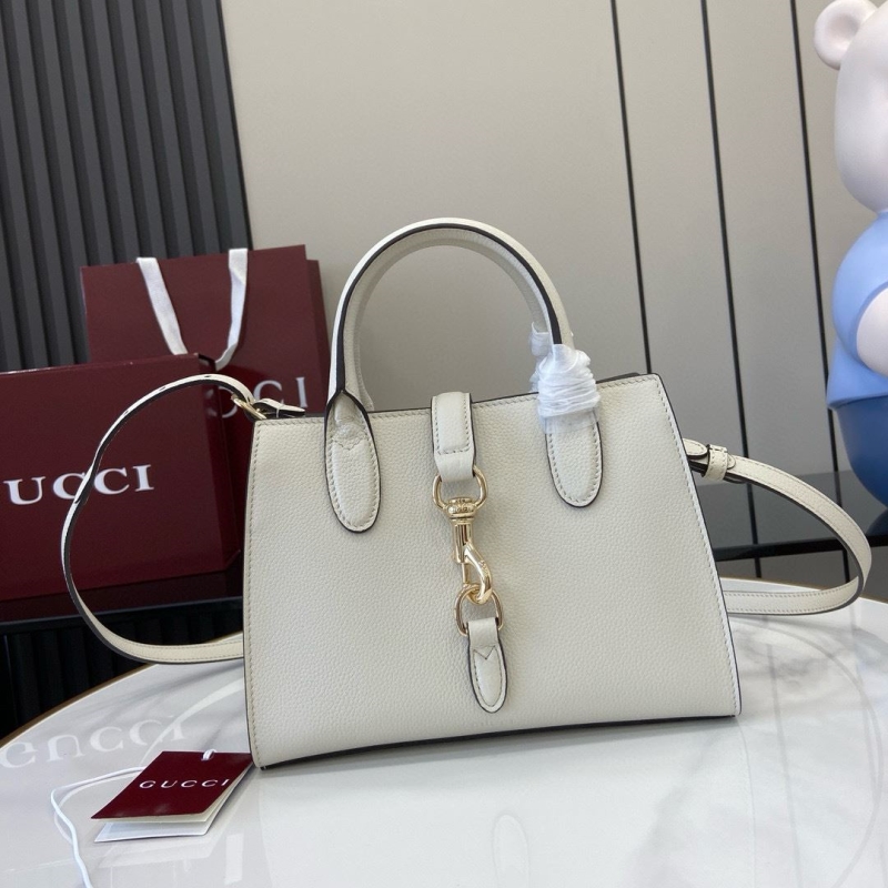G*u*i top handle bags